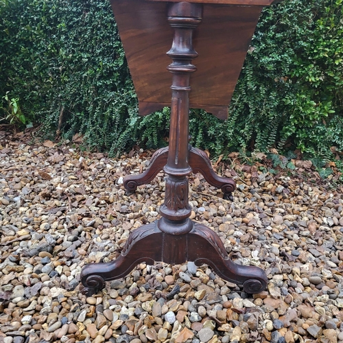 320 - A VICTORIAN WALNUT LADIES’ WORK TABLE
With single drawer and basket, on acanthus carved turned suppo... 