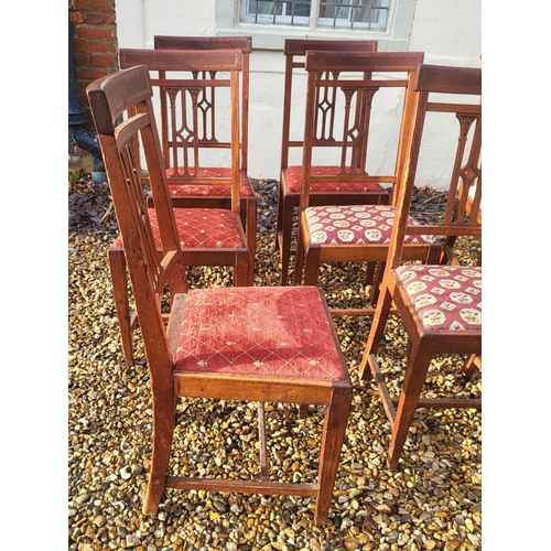 323 - A SET OF SIX MAHOGANY AND SATINWOOD CROSSBANDED DINING CHAIRS
Along with a pair of Georgian mahogany... 