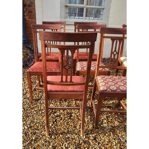 323 - A SET OF SIX MAHOGANY AND SATINWOOD CROSSBANDED DINING CHAIRS
Along with a pair of Georgian mahogany... 