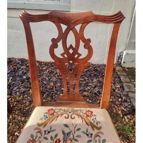 323 - A SET OF SIX MAHOGANY AND SATINWOOD CROSSBANDED DINING CHAIRS
Along with a pair of Georgian mahogany... 