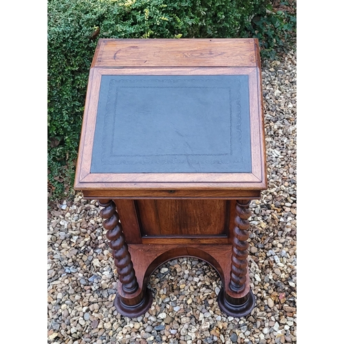 331 - A VICTORIAN ROSEWOOD DAVENPORT DESK
With leather surface, enclosing a fitted interior, with cupboard... 