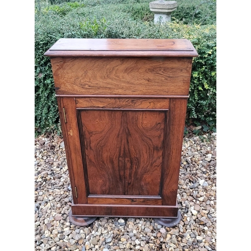 331 - A VICTORIAN ROSEWOOD DAVENPORT DESK
With leather surface, enclosing a fitted interior, with cupboard... 