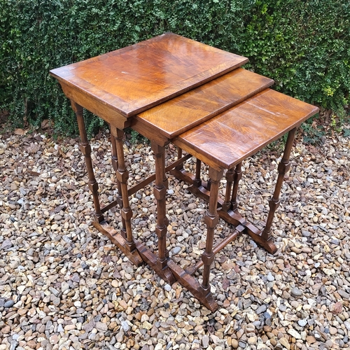 332 - AN EDWARDIAN MAHOGANY FOLDING THREE TIER CAKE STAND
Along with a Victorian mahogany occasional table... 