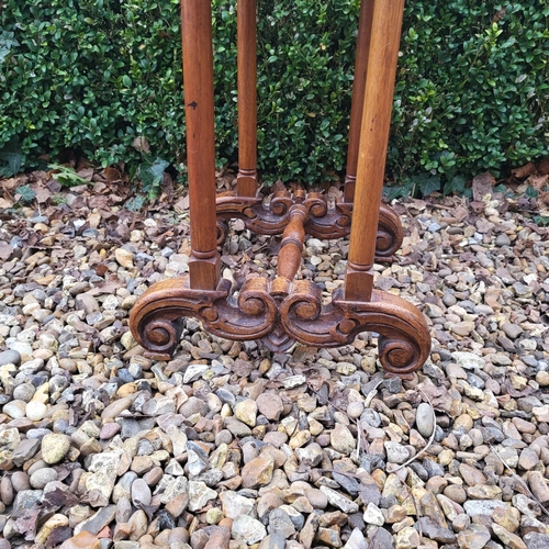 332 - AN EDWARDIAN MAHOGANY FOLDING THREE TIER CAKE STAND
Along with a Victorian mahogany occasional table... 