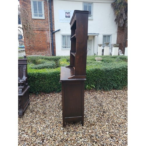 333 - A 17TH CENTURY STYLE OAK DRESSER
With open shelves above two drawers and cupboards.
(w 106cm x d 39c... 