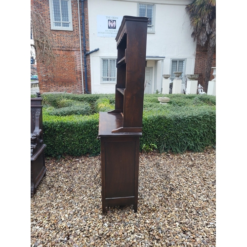 333 - A 17TH CENTURY STYLE OAK DRESSER
With open shelves above two drawers and cupboards.
(w 106cm x d 39c... 