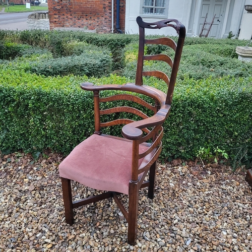 335 - A 19TH CENTURY ELM LADDER BACK CORNER CHAIR
With pierced serpentine top rail, overstuffed upholstere... 