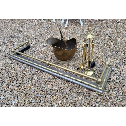 337 - A BRASS AND IRON FIRE CURB
Along with companion set and coal hood.
(w 133cm)

Condition: good overal... 