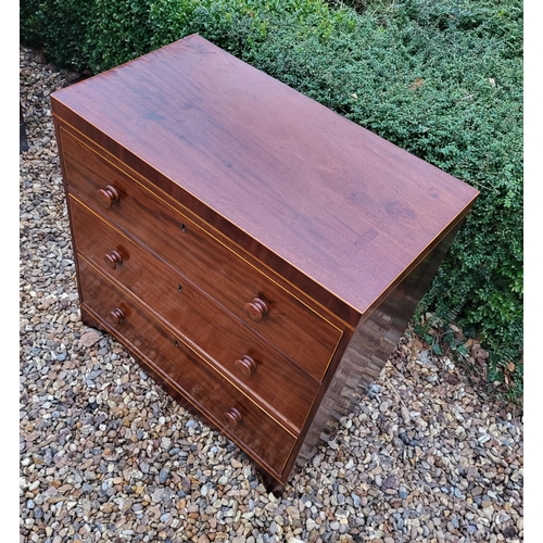 340 - A VICTORIAN MAHOGANY CHEST OF THREE LONG DRAWERS
Fitted with knob handles, on shaped apron on bracke... 