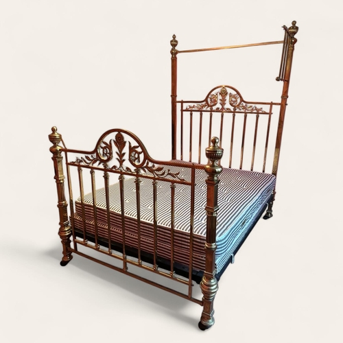 342 - A VICTORIAN BRASS HALF TESTER BEDSTEAD
With cast foliage head and foot, flanked by square and turned... 