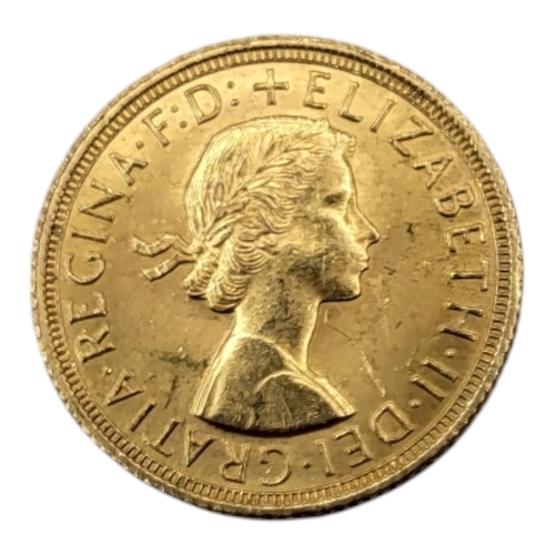 51 - A QUEEN ELIZABETH II 22CT GOLD FULL SOVEREIGN COIN, DATED 1958 
With George and Dragon to reverse.

... 