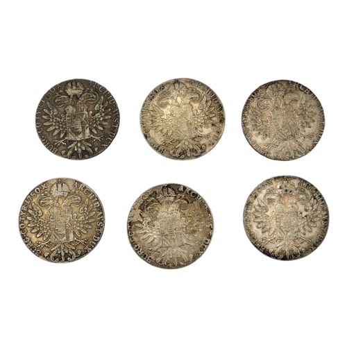 68 - A COLLECTION OF SIX AUSTRIAN SILVER MARIA THERESA THALER COINS 
Each bearing the date 1780 with the ... 