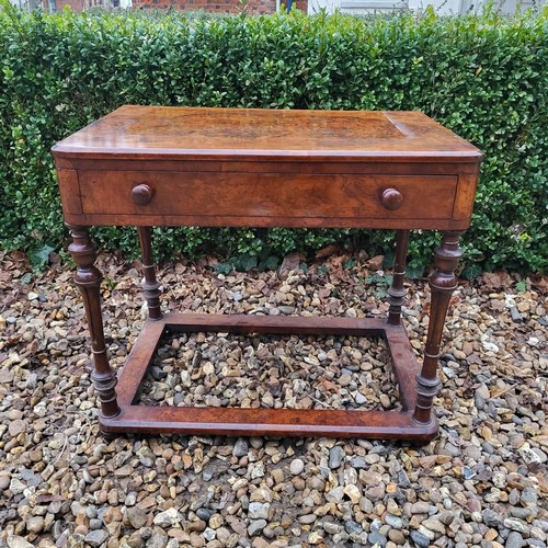 314 - A VICTORIAN WALNUT SIDE TABLE
With single drawer on turned legs along with a mahogany dish top occas... 