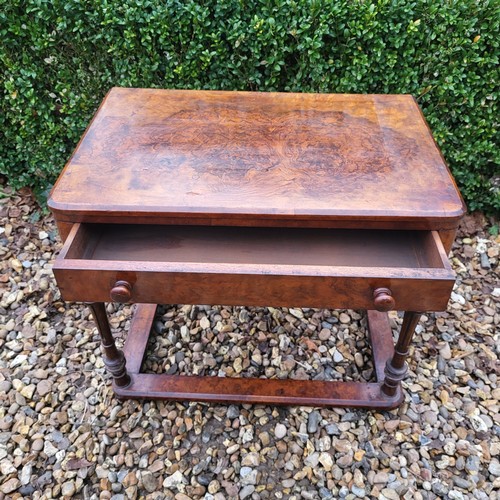 314 - A VICTORIAN WALNUT SIDE TABLE
With single drawer on turned legs along with a mahogany dish top occas... 