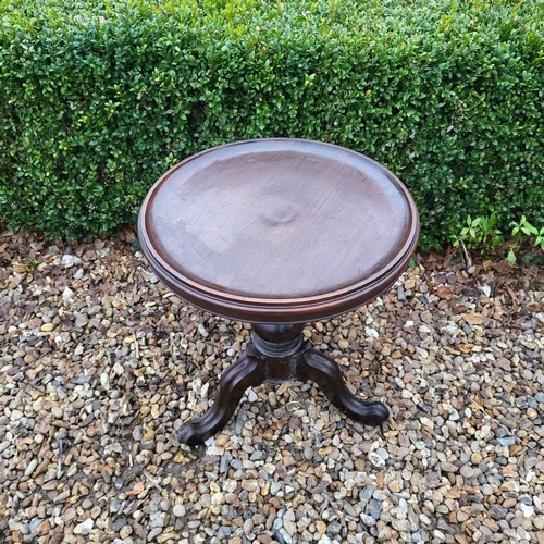 314 - A VICTORIAN WALNUT SIDE TABLE
With single drawer on turned legs along with a mahogany dish top occas... 