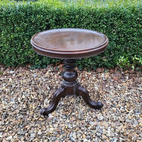 314 - A VICTORIAN WALNUT SIDE TABLE
With single drawer on turned legs along with a mahogany dish top occas... 