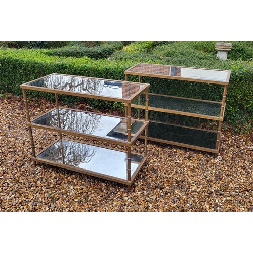 353 - ATTRIBUTED TO MAISON JENSON, A RARE PAIR OF BRONZE THREE TIER CONSOLE TABLES
With planished mirrored... 