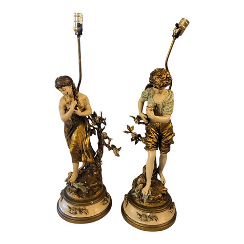 197 - AFTER FRANCIS & AUGUSTE MOREAU, A PAIR OF ART NOUVEAU STYLE SPELTER FIGURAL LAMPS
Depicting male and... 