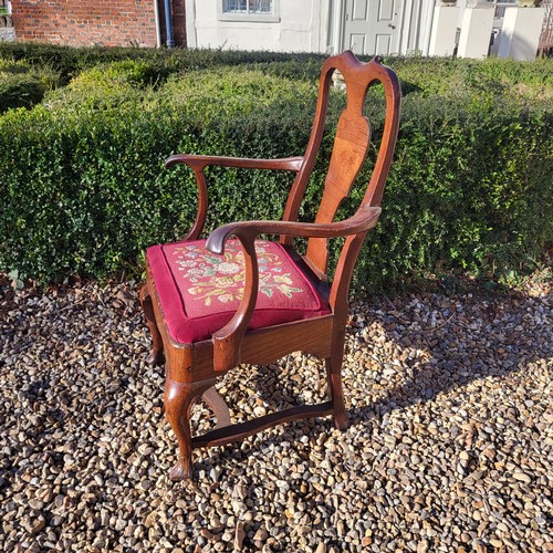 369 - AN 18TH CENTURY OAK OPEN ARMCHAIR
With vase splat back, scroll arms, tapestry upholstered seat deep ... 