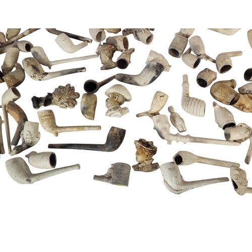 123 - A COLLECTION OF VICTORIAN AND LATER CLAY PIPES
To include Lord Kitchener, Edwardian ladies and Dick ... 