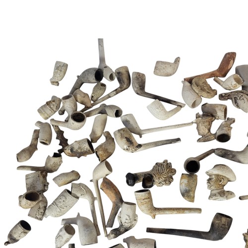 123 - A COLLECTION OF VICTORIAN AND LATER CLAY PIPES
To include Lord Kitchener, Edwardian ladies and Dick ... 