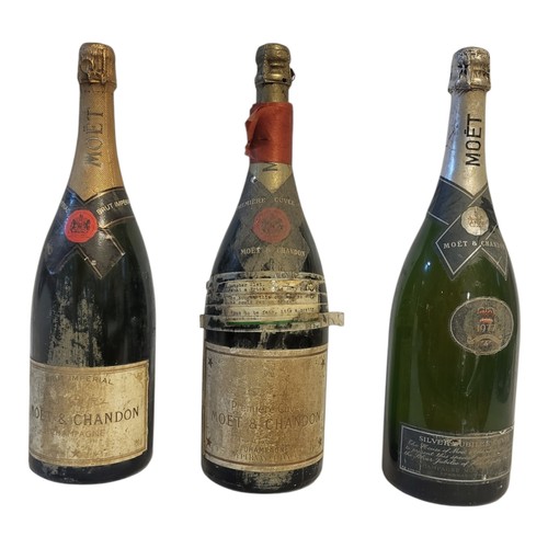 214 - MOËT AND CHANDON, THREE MAGNUM BOTTLES OF VINTAGE CHAMPAGNE
To include a Silver Jubilee 1977 Royal c... 