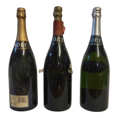 214 - MOËT AND CHANDON, THREE MAGNUM BOTTLES OF VINTAGE CHAMPAGNE
To include a Silver Jubilee 1977 Royal c... 