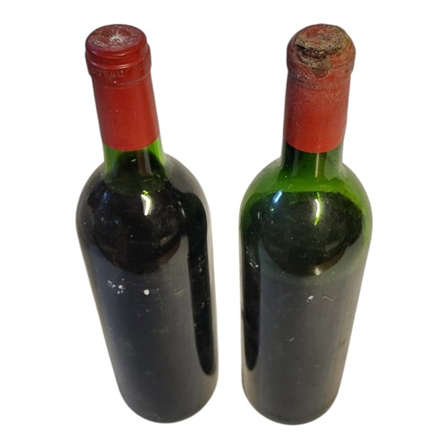 226 - CHÂTEAU MOUTON ROTHSCHILD, TWO BOTTLES OF VINTAGE RED WINE, DATED 1968 
Number 30534 and 1978 .
(app... 