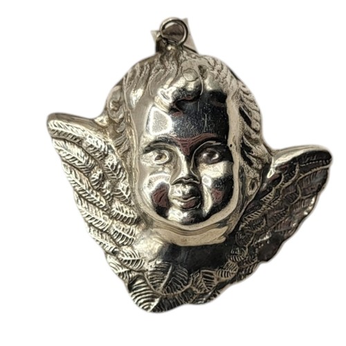 89 - A CONTINENTAL SILVER CHERUB PENDANT
After Raphael with hanging bale, marked .925.
(approx 6cm)

Cond... 