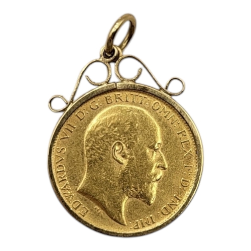 99 - A KING EDWARD VII 22CT GOLD HALF SOVEREIGN PENDANT, DATED 1905 
With portrait bust and George and dr... 