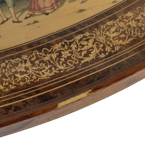 104 - AN EARLY 20TH CENTURY ITALIAN SORRENTO WARE OLIVE WOOD GALLERY TRAY
Twin handles with glazed inlaid ... 