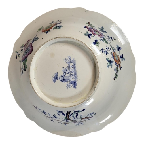 106 - ROCKINGHAM, A LARGE 19TH CENTURY PORCELAIN PEDESTAL BOWL
Hand painted decoration with blue border an... 