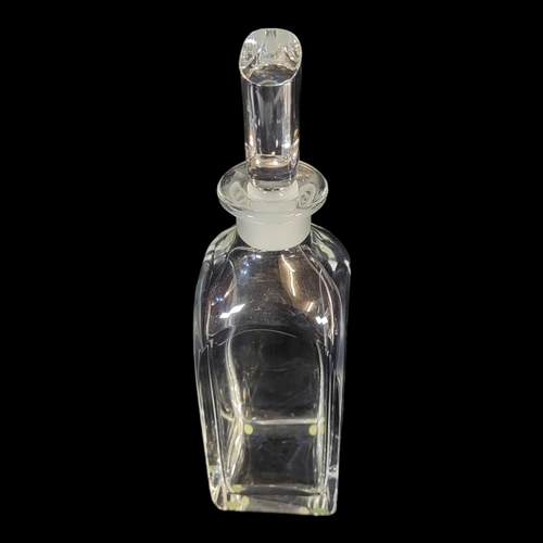 114 - ORREFORS, A MID CENTURY LEAD CRYSTAL DECANTER
Rectangular stopper and bottle, signed to base.


Cond... 