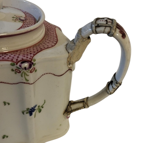 117 - A COLLECTION OF 18TH CENTURY NEWHALL PORCELAIN TEAWARE 
Comprising two teapots, two cream jugs, two ... 