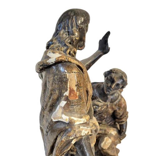 127 - AN 18TH/19TH CENTURY GERMAN/FLEMISH SCHOOL ECCLESIASTICAL CARVED WOOD AND GILDED GESSO FIGURAL GROUP... 