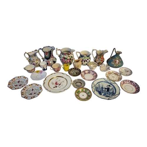 149 - A MIXED COLLECTION OF EARLY 19TH CENTURY AND LATER STAFFORDSHIRE JUGS, CUPS AND SAUCERS 
Comprising ... 