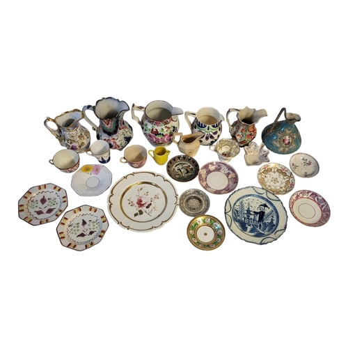 149 - A MIXED COLLECTION OF EARLY 19TH CENTURY AND LATER STAFFORDSHIRE JUGS, CUPS AND SAUCERS 
Comprising ... 