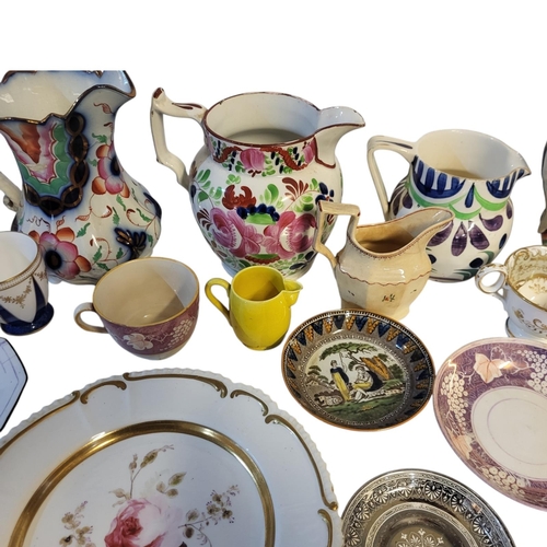 149 - A MIXED COLLECTION OF EARLY 19TH CENTURY AND LATER STAFFORDSHIRE JUGS, CUPS AND SAUCERS 
Comprising ... 