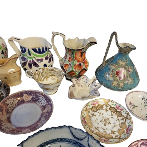 149 - A MIXED COLLECTION OF EARLY 19TH CENTURY AND LATER STAFFORDSHIRE JUGS, CUPS AND SAUCERS 
Comprising ... 