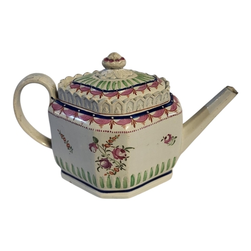 152 - AN 18TH CENTURY ENGLISH CREAMWARE TEAPOT AND COVER, CIRCA 1780 - 1800
Swirl flute lozenge form pink ... 