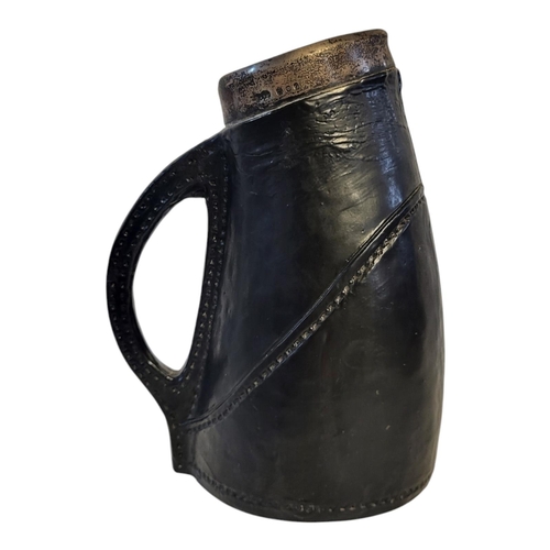 154 - ROYAL DOULTON, A SIMULATED LEATHER BLACK JACK JUG, CIRCA 1900
With Sterling silver rim for London, 1... 