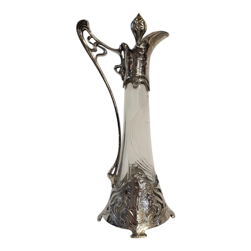 158 - A GERMAN WMF SILVER PLATED AND CLEAR GLASS CLARET JUG AND STOPPER, CIRCA 1900 - 1910
Jugendstil peri... 