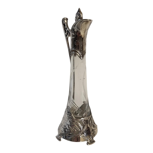 158 - A GERMAN WMF SILVER PLATED AND CLEAR GLASS CLARET JUG AND STOPPER, CIRCA 1900 - 1910
Jugendstil peri... 