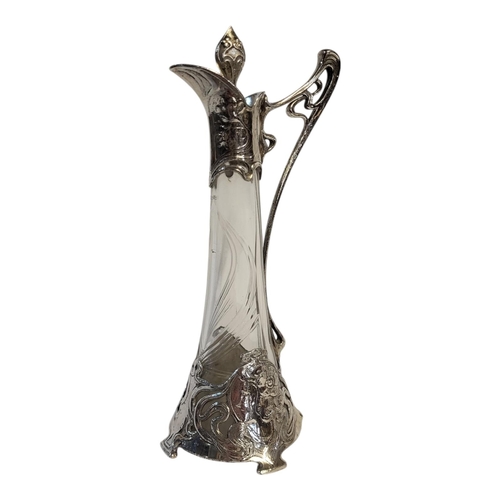 158 - A GERMAN WMF SILVER PLATED AND CLEAR GLASS CLARET JUG AND STOPPER, CIRCA 1900 - 1910
Jugendstil peri... 