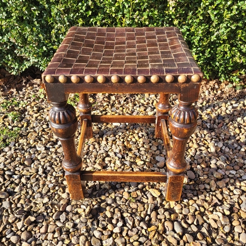 352 - A LATE VICTORIAN OAK MILKING STOOL
Along with an Elizabethan style oak stool with woven leather seat... 