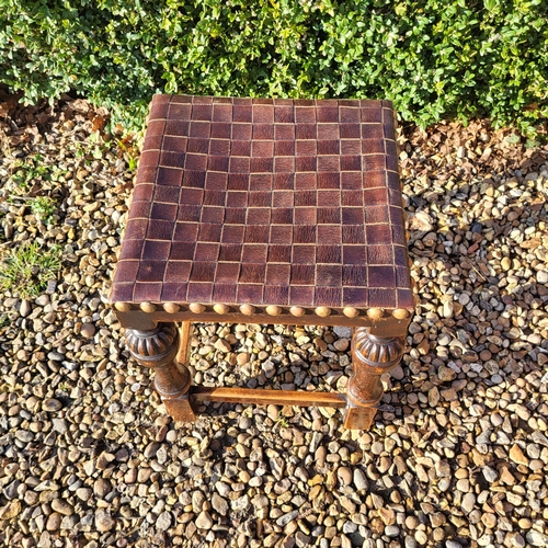 352 - A LATE VICTORIAN OAK MILKING STOOL
Along with an Elizabethan style oak stool with woven leather seat... 