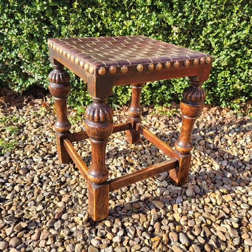 352 - A LATE VICTORIAN OAK MILKING STOOL
Along with an Elizabethan style oak stool with woven leather seat... 