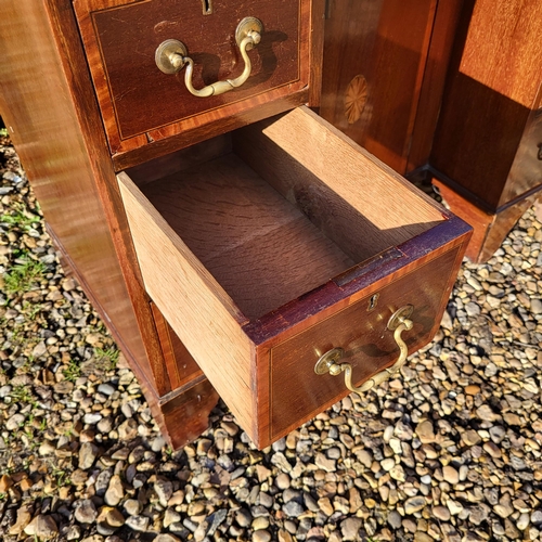 353 - A LATE VICTORIAN MAHOGANY AND SHELL INLAID SHERATON INSPIRED KNEEHOLE DESK
With an arrangement of se... 