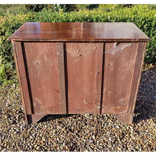 353 - A LATE VICTORIAN MAHOGANY AND SHELL INLAID SHERATON INSPIRED KNEEHOLE DESK
With an arrangement of se... 