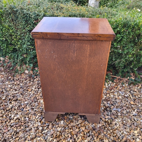 355 - A REGENCY STYLE YEW PEDESTAL CHEST
The fold over top with green tooled leather writing surface above... 